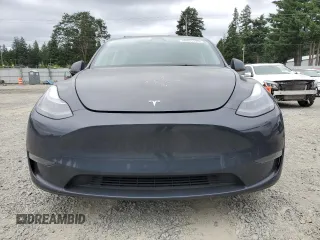 2024 Tesla Model Y Long Range with VIN 7SAYGDEE9RF069801, listed as a Copart auction lot 60857145 with 18,808 mi miles and Salvage title. Bid and sale history available at DreamBid. Image 5.