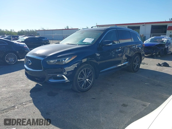 2016 Infiniti QX60 with VIN 5N1AL0MN4GC532048, listed as a IAAI auction lot 41832885 with 125,306 mi miles and . Bid and sale history available at DreamBid. Image 17.