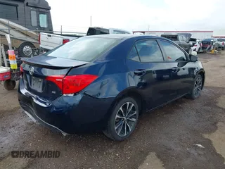 2017 Toyota Corolla L with VIN 5YFBURHE5HP685616, listed as a IAAI auction lot 42388072 with 144,356 mi miles and . Bid and sale history available at DreamBid. Image 4.