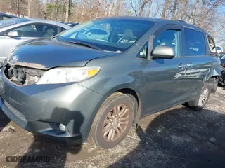 2014 Toyota Sienna XLE with VIN 5TDYK3DC1ES524300, listed as a IAAI auction lot 41430420 with 121,301 mi miles. Bid and sale history available at carsss.com. Image 21.