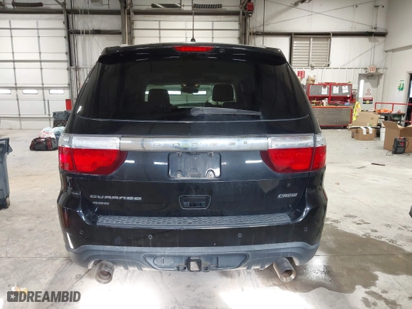 2013 Dodge Durango Crew with VIN 1C4SDJDT9DC670738, listed as a IAAI auction lot 41329419 with 149,520 mi miles. Bid and sale history available at carsss.com. Image 17.