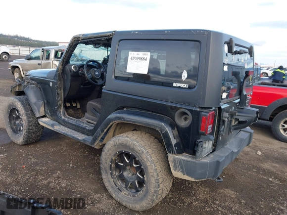 2014 Jeep Wrangler Sahara with VIN 1C4AJWBG5EL247812, listed as a IAAI auction lot 40909884 with 106,475 mi miles and . Bid and sale history available at DreamBid. Image 3.