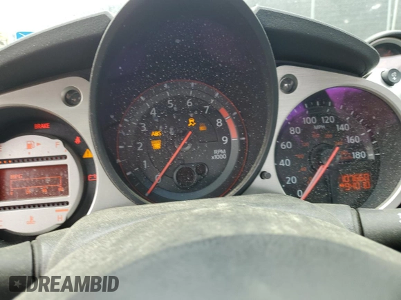 2010 Nissan 370Z with VIN JN1AZ4EH6AM505621, listed as a Copart auction lot 52745505 with 107,660 mi miles and Salvage Title. Bid and sale history available at carsss.com. Image 9.