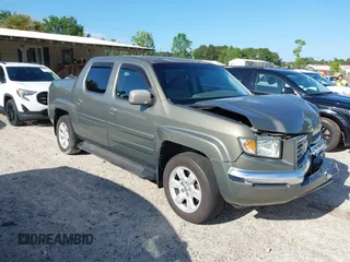 2007 Honda Ridgeline RTL z VIN 2HJYK16537H530129, wystawiony jako IAAI lot #42191209 z przebiegiem 181 686 mil mil oraz . Historia ofert i sprzedaży dostępna na DreamBid. Obrazek 1.