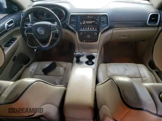 2015 Jeep Grand Cherokee High Altitude with VIN 1C4RJECG4FC654789, listed as a Copart auction lot 49378875 with 163,192 mi miles and Salvage Title. Bid and sale history available at carsss.com. Image 8.