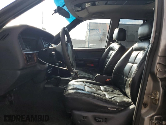 1997 Jeep Grand Cherokee Limited with VIN 1J4GZ78Y0VC556381, listed as a Copart auction lot 46221845 with 191,778 mi miles and Salvage Title. Bid and sale history available at carsss.com. Image 7.