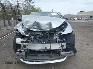 2024 Lexus RZ 450e Premium z VIN JTJAAAAB9RA025975, wystawiony jako IAAI lot #42122679 z przebiegiem Nie podano mil oraz . Historia ofert i sprzedaży dostępna na DreamBid. Obrazek 11.