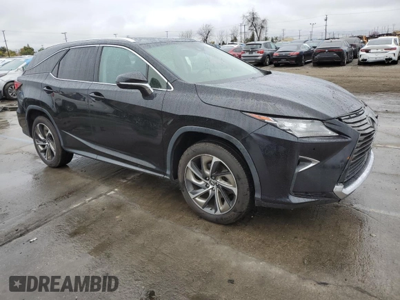 2019 Lexus RX 350L Premium with VIN JTJGZKCA0K2011427, listed as a Copart auction lot 51345285 with 77,256 mi miles and Salvage title. Bid and sale history available at DreamBid. Image 4.