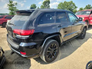 2018 Jeep Grand Cherokee Laredo E z VIN 1C4RJFAGXJC287415, wystawiony jako Copart lot #64182975 z przebiegiem 103 817 mil mil oraz Szkoda całkowita • Salvage title. Historia ofert i sprzedaży dostępna na DreamBid. Obrazek 3.