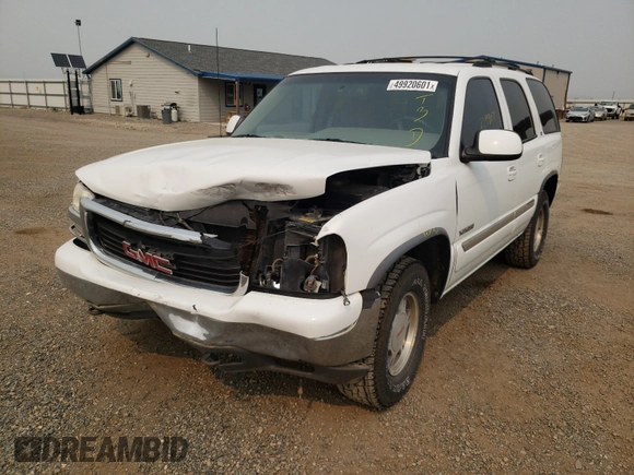 2001 GMC Yukon SLT z VIN 1GKEK13T61J150626, wystawiony jako Copart lot #49920601 z przebiegiem 224 707 mil mil oraz Czysty tytuł • Clean title. Historia ofert i sprzedaży dostępna na DreamBid. Obrazek 2.