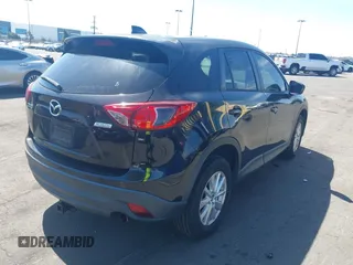 2013 Mazda CX-5 Touring with VIN JM3KE2CEXD0153589, listed as a IAAI auction lot 41855356 with 86,030 mi miles and . Bid and sale history available at DreamBid. Image 4.