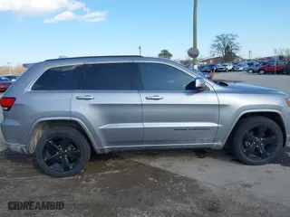 2015 Jeep Grand Cherokee Altitude with VIN 1C4RJFAG3FC210151, listed as a IAAI auction lot 41865151 with 122,579 mi miles. Bid and sale history available at carsss.com. Image 13.