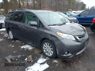 2012 Toyota Sienna XLE with VIN 5TDDK3DC9CS047014, listed as a IAAI auction lot 41551585 with 164,440 mi miles. Bid and sale history available at carsss.com. Image 1.