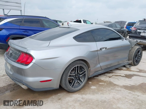2020 Ford Mustang EcoBoost with VIN 1FA6P8TH9L5139174, listed as a IAAI auction lot 42148089 with 115,979 mi miles and . Bid and sale history available at DreamBid. Image 4.