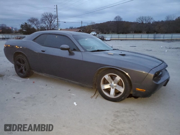 2014 Dodge Challenger R/T Plus z VIN 2C3CDYBT5EH160826, wystawiony jako Copart lot #82748844 z przebiegiem 160 152 mil mil oraz Szkoda całkowita • Salvage title. Historia ofert i sprzedaży dostępna na DreamBid. Obrazek 4.