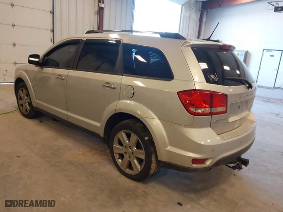 2014 Dodge Journey Limited with VIN 3C4PDDDG4ET175007, listed as a IAAI auction lot 41888742 with 218,585 mi miles. Bid and sale history available at carsss.com. Image 3.