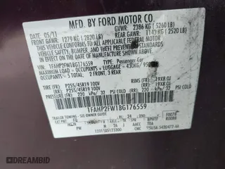2011 Ford Taurus Limited with VIN 1FAHP2FW1BG176559, listed as a IAAI auction lot 41424649 with 256520 miles. Bid and sale history available at carsss.com. Image 9.
