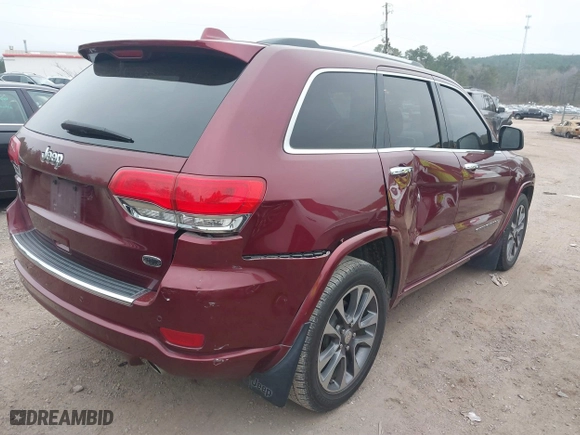 2017 Jeep Grand Cherokee Overland with VIN 1C4RJECG6HC719001, listed as a IAAI auction lot 41795517 with 103,076 mi miles. Bid and sale history available at carsss.com. Image 4.