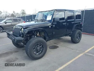 2014 Jeep Wrangler Unlimited Rubicon with VIN 1C4BJWFG0EL116026, listed as a IAAI auction lot 41729074 with 154,597 mi miles. Bid and sale history available at carsss.com. Image 2.