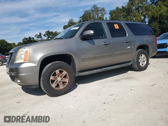 2012 GMC Yukon XL SLE with VIN 1GKS1HE06CR250652, listed as a Copart auction lot 74424294 with 129,208 mi miles and Salvage Title. Bid and sale history available at carsss.com. Image 1.