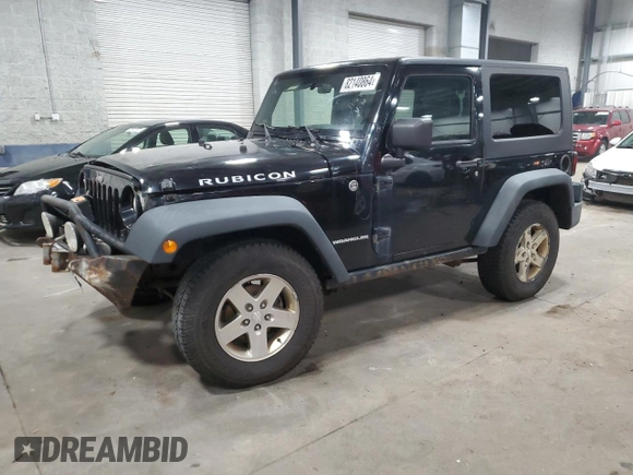 2009 Jeep Wrangler Rubicon with VIN 1J4GA64159L770895, listed as a Copart auction lot 82140864 with 209,464 mi miles and Salvage Title. Bid and sale history available at DreamBid. Image 1.