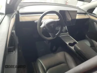 2024 Tesla Model Y Long Range с VIN 7SAYGDEE8RA266519, выставлен на аукционе Copart как лот 60899095 с пробегом Не указан миль и Списание • Salvage title. История ставок и продаж доступна на DreamBid. Изображение 8.