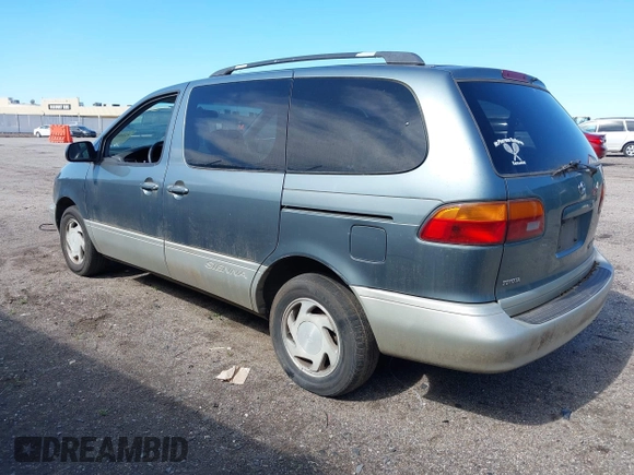 2000 Toyota Sienna LE with VIN 4T3ZF13C6YU173739, listed as a IAAI auction lot 42162320 with 173,659 mi miles. Bid and sale history available at carsss.com. Image 3.