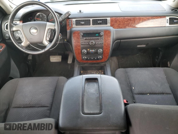 2012 Chevrolet Suburban LS with VIN 1GNWKLEG3CR308413, listed as a Copart auction lot 83671324 with 141,053 mi miles and Salvage title. Bid and sale history available at DreamBid. Image 8.
