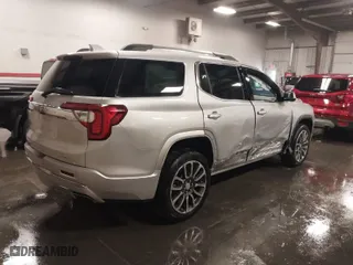 2020 GMC Acadia Denali with VIN 1GKKNXLS9LZ215459, listed as a IAAI auction lot 40815587 with 58,389 mi miles. Bid and sale history available at carsss.com. Image 4.