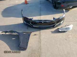 2014 Tesla Model S 60 с VIN 5YJSA1H16EFP50018, выставлен на аукционе Copart как лот 64372605 с пробегом 165 910 миль миль и Списание • Salvage title. История ставок и продаж доступна на DreamBid. Изображение 12.