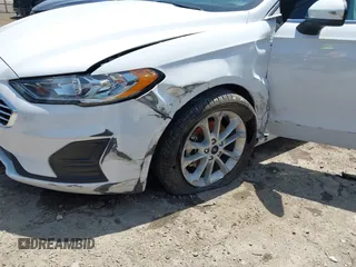 2020 Ford Fusion SE с VIN 3FA6P0HD4LR232009, выставлен на аукционе IAAI как лот 42207523 с пробегом 71 206 миль миль и . История ставок и продаж доступна на DreamBid. Изображение 6.