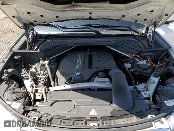 2014 BMW X5 xDrive35i with VIN 5UXKR0C58E0C27855, listed as a Copart auction lot 52254595 with 134,259 mi miles and Clean Title. Bid and sale history available at carsss.com. Image 12.