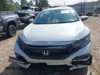 2021 Honda Civic Sport with VIN SHHFK7H46MU217885, listed as a IAAI auction lot 41942520 with 82,328 mi miles and . Bid and sale history available at DreamBid. Image 13.