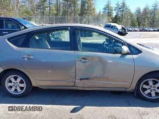 2004 Toyota Prius z VIN JTDKB20U140070419, wystawiony jako IAAI lot #41985652 z przebiegiem 227 401 mil mil oraz . Historia ofert i sprzedaży dostępna na DreamBid. Obrazek 13.