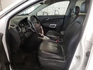 2014 Chevrolet Captiva Sport LT with VIN 3GNAL3EK4ES661268, listed as a Copart auction lot 74895224 with 128,513 mi miles and Salvage Title. Bid and sale history available at DreamBid. Image 7.