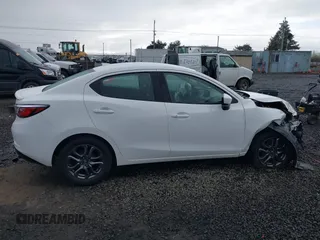 2019 Toyota Yaris L z VIN 3MYDLBYV5KY506616, wystawiony jako IAAI lot #41905500 z przebiegiem 62 758 mil mil oraz . Historia ofert i sprzedaży dostępna na DreamBid. Obrazek 13.