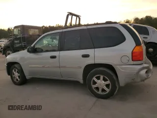 2008 GMC Envoy SLE1 with VIN 1GKDS13S282122684, listed as a Copart auction lot 80488104 with 262,167 mi miles and Salvage Title. Bid and sale history available at DreamBid. Image 2.