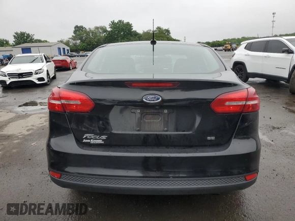 2016 Ford Focus SE z VIN 1FADP3F26GL340954, wystawiony jako Copart lot #60989915 z przebiegiem 26 052 mil mil oraz Szkoda całkowita • Salvage title. Historia ofert i sprzedaży dostępna na DreamBid. Obrazek 6.