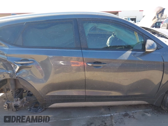 2018 Hyundai Tucson Sport with VIN KM8J33AL5JU770092, listed as a IAAI auction lot 41395349 with 101,395 mi miles. Bid and sale history available at carsss.com. Image 14.