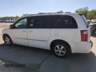 2010 Dodge Grand Caravan SXT with VIN 2D4RN5D16AR444938, listed as a Copart auction lot 56762695 with 251,437 mi miles and Clean Title. Bid and sale history available at DreamBid. Image 2.