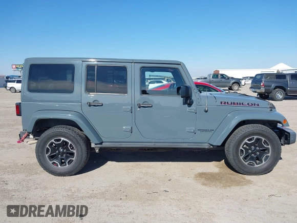 2015 Jeep Wrangler Unlimited Rubicon with VIN 1C4BJWFG7FL525724, listed as a IAAI auction lot 41394059 with 132,058 mi miles. Bid and sale history available at carsss.com. Image 14.