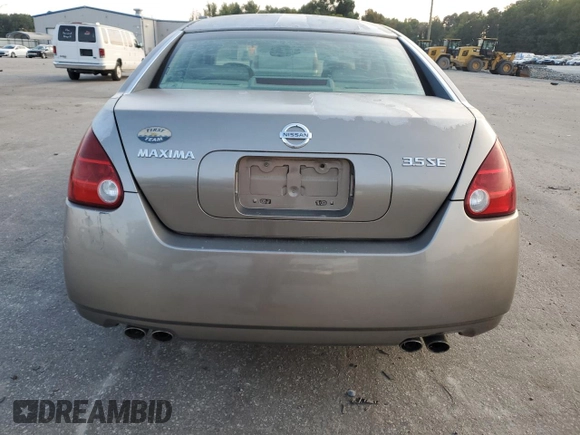 2004 Nissan Maxima SE with VIN 1N4BA41E24C878448, listed as a Copart auction lot 72596984 with 329,525 mi miles and Salvage Title. Bid and sale history available at carsss.com. Image 6.