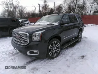 2020 GMC Yukon Denali with VIN 1GKS2CKJ6LR138351, listed as a IAAI auction lot 41316462 with 107,489 mi miles. Bid and sale history available at carsss.com. Image 2.