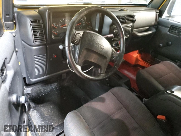 2003 Jeep Wrangler Rubicon with VIN 1J4FA69S23P322353, listed as a Copart auction lot 43915745 with 117,769 mi miles and Salvage title. Bid and sale history available at DreamBid. Image 8.