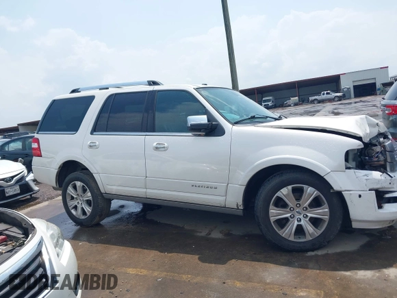 2015 Ford Expedition Platinum z VIN 1FMJU1LT8FEF18854, wystawiony jako IAAI lot #42127115 z przebiegiem 178 647 mil mil oraz . Historia ofert i sprzedaży dostępna na DreamBid. Obrazek 13.