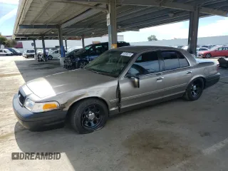 2001 Ford Crown Victoria LX z VIN 2FAFP74W31X110840, wystawiony jako Copart lot #53005015 z przebiegiem 133 602 mil mil oraz Szkoda całkowita • Salvage title. Historia ofert i sprzedaży dostępna na DreamBid. Obrazek 1.