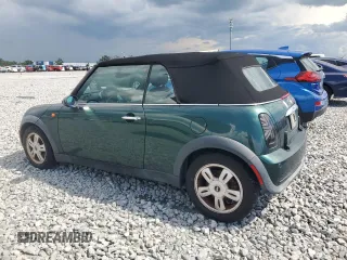 2007 MINI Convertible with VIN WMWRF335X7TG16568, listed as a Copart auction lot 66146885 with 97,502 mi miles and Clean title. Bid and sale history available at DreamBid. Image 2.