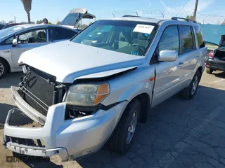 2008 Honda Pilot SE with VIN 5FNYF28318B022789, listed as a IAAI auction lot 41883657 with 129,059 mi miles. Bid and sale history available at carsss.com. Image 2.