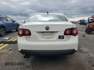2009 Volkswagen Jetta SE z VIN 3VWRM71K39M057367, wystawiony jako Copart lot #58745235 z przebiegiem 130 647 mil mil oraz Szkoda całkowita • Salvage title. Historia ofert i sprzedaży dostępna na DreamBid. Obrazek 6.