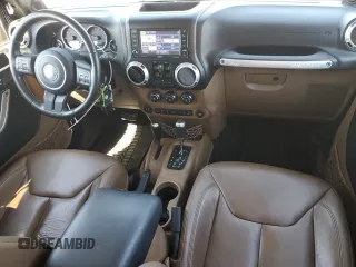 2013 Jeep Wrangler Unlimited Rubicon 10th Anniversary with VIN 1C4HJWFG4DL550832, listed as a Copart auction lot 71633684 with 60,759 mi miles and Salvage title. Bid and sale history available at DreamBid. Image 8.